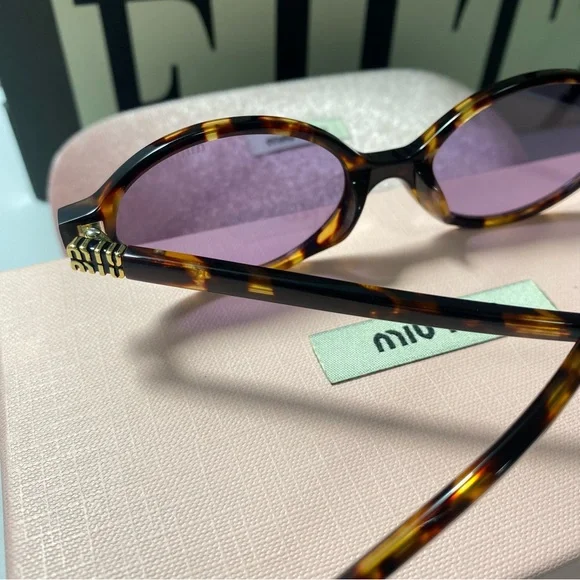 Miu Miu Tortoise Sunglasses with Lavender Lenses display picture 1